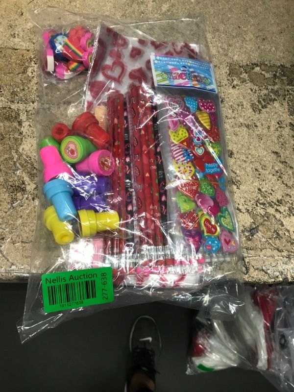 Photo 1 of 102PCS Valentine Stationary Set with Cellophane Treat Bags Valentines Day Gifts for Kids Classroom Exchange Prizes Party Favors with Erasers Stampers Stickers Cards Pencils