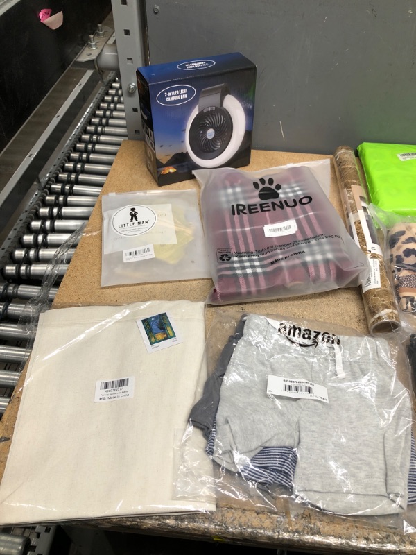 Photo 1 of 10 PCS RANDOM BUNDLE INCLUDES BAGS, A FAN, CLOTHES, AND PARTY ACCESSORIES 