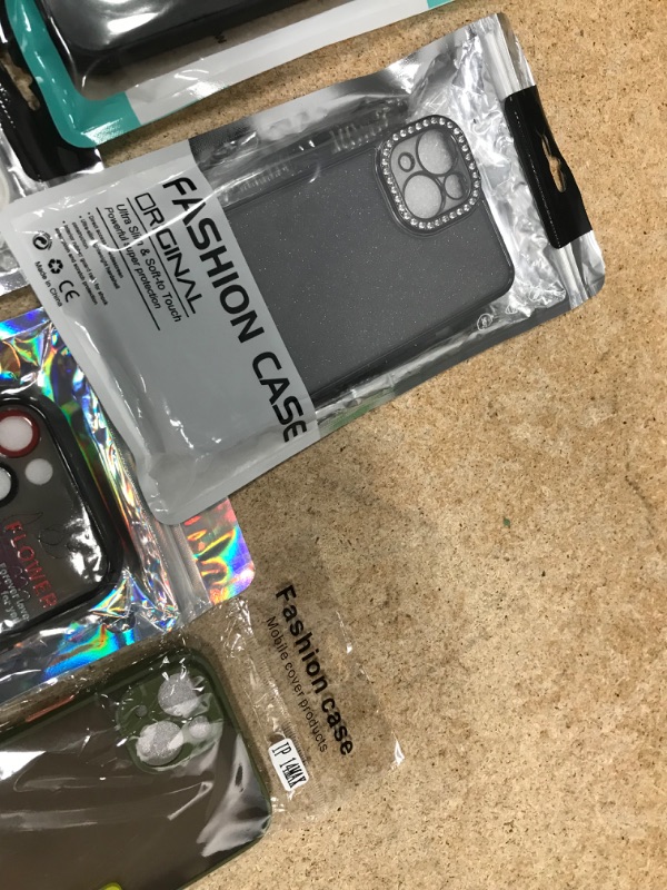 Photo 1 of iPhone Cases & Accessories Bundle (14pc)