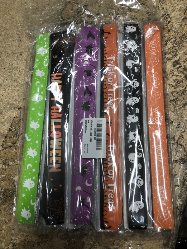 Photo 2 of ASTARON 600 Pieces Halloween Paper Wristbands 3/4 inch Halloween Theme Paper Bracelets for Haunted House Party Ghost Party Supplies, 6 Designs