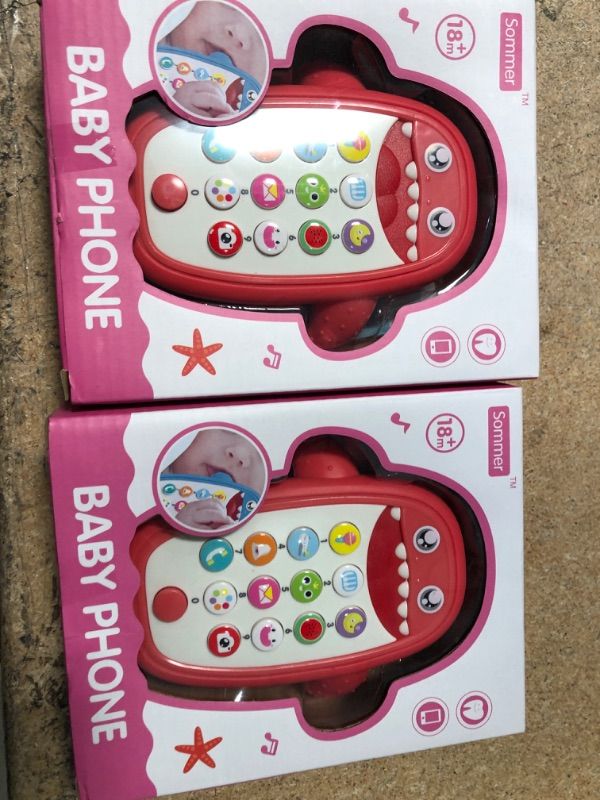 Photo 2 of Baby Shark Cell Phone Toy with Removable Teether Case, Light up, Music & Adjustable Volume Kids Play & Learn Fake Phone for Infant & Toddler, Preschool Birthday Gift for Girl Boy 18+ Months (Red) 2 PACK.
