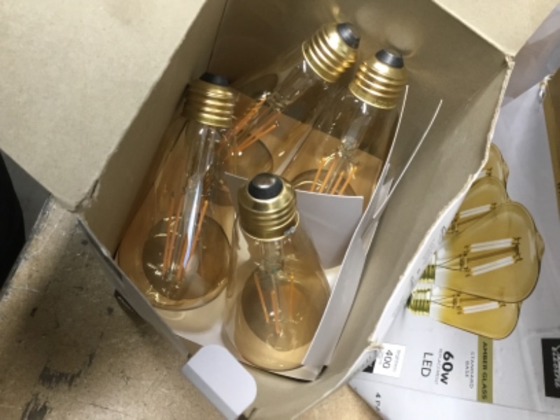 Photo 2 of 
Feit Electric
60W Equivalent ST19 Dimmable Straight Filament Amber Glass Vintage Edison LED Light Bulb, Warm White (4-Pack)