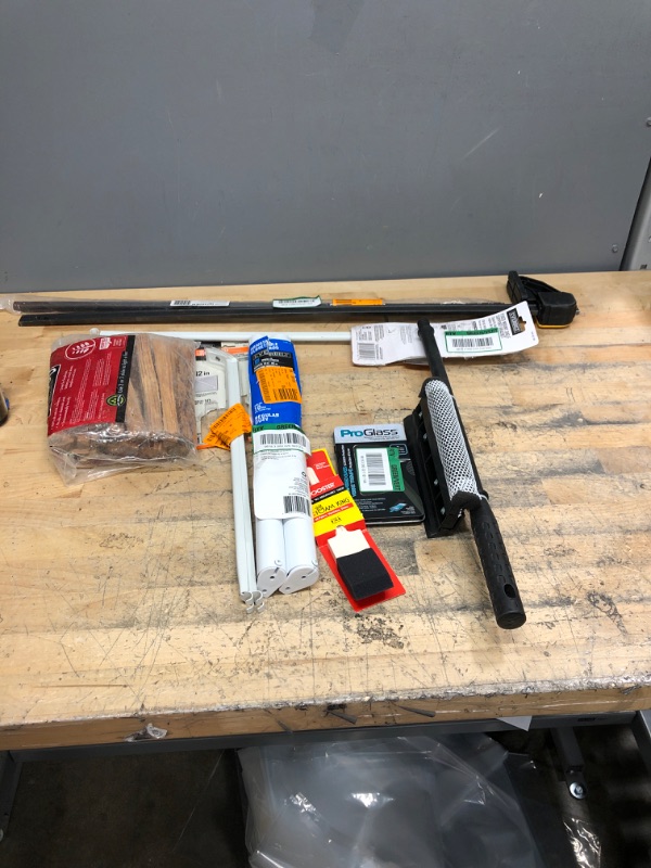 Photo 1 of *Bundle* home accessories including 
various sized brackets, window scrubber, firestarter, and mobile screen protector 