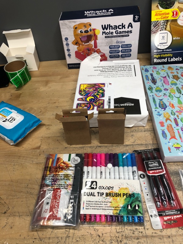 Photo 1 of Bundle of misc childrens and office accessories including pens, markers, crayons,erasers,, paper and whack a mole game.