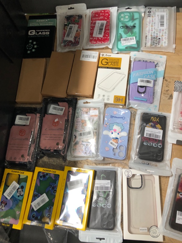 Photo 1 of 24 Pack Assorted iPhone Cases, Screen Protectors and Accessories Bundle 
