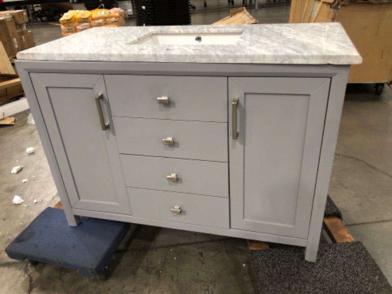 Photo 2 of (CHIPPED MARBLE)
Home Decorators Collection Rockleigh 48 in. W x 22 in. D Bath Vanity in Pebble Grey with Marble Vanity Top in Carrara White with White Basin