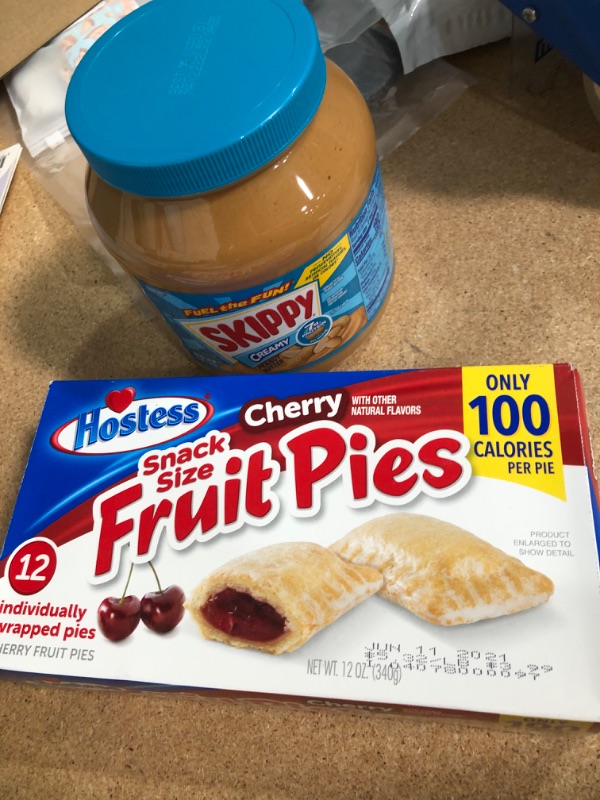 Photo 1 of **EXPIRES BETWEEN JUNE2021/ MAY2022** FOOD BUNDLE ( PEANUT BUTTER, CHERRY PIES)