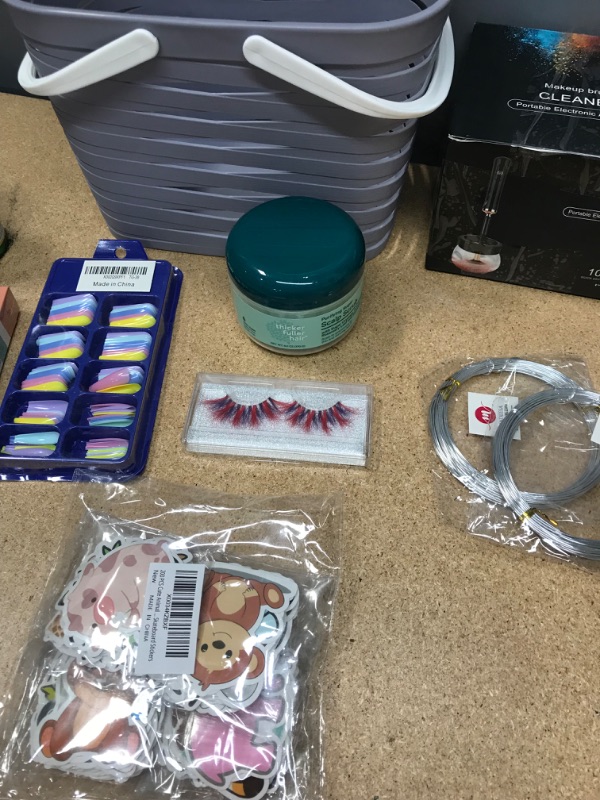 Photo 2 of ***NON-REFUNDABLE***
HOUSEHOLD BUNDLE
PLASTIC CONTAINER, BIOTIN,TATOO LIPSTICK,SCALP SCRUB,COLERUL FAKE NAILS,EYELASH, 4 PACK SILICONE RINGS, SKATE BOARD STICKERS,2 PACK JEWLERY WIRE,MUG,FACE MASK,ROBIN DECORATIONS, MAKE UP BRUSH CLEANER