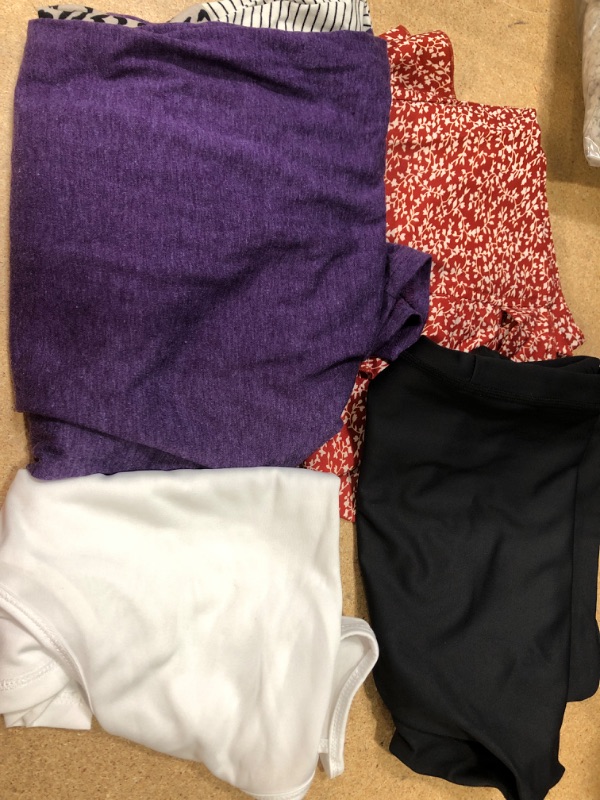 Photo 1 of BUNDLE OF ASSORTED CLOTHING- SKIRT, ACTIVE WEAR- SOLD AS IS, NO RETURNS,NONREFUNDABLE 