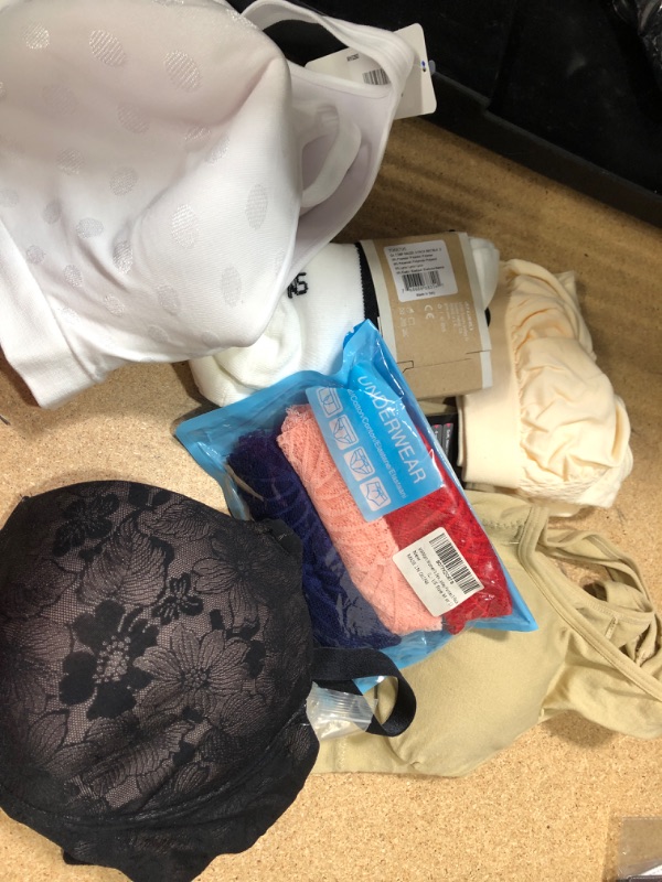 Photo 1 of BUNDLE OF ASSORTED APPAREL- BRAS, SOCKS, UNDERWEAR- SOLD AS IS, NO RETURNS, NONREFUNDABLE 