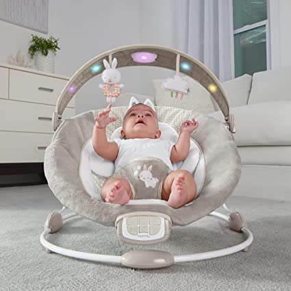 Photo 1 of Ingenuity InLighten Baby Bouncer Seat with Light Up Toy Bar and Bunny Tummy Time Pillow Mat - Twinkle Tails, Newborn and up
