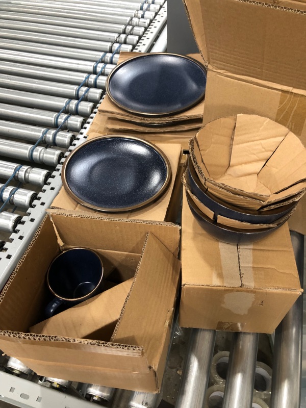 Photo 1 of 8-piece place setting.. 2 plates, 2 saucers, 2 bowls, 1 cup **missing 1 cup*** blue with gold edging 