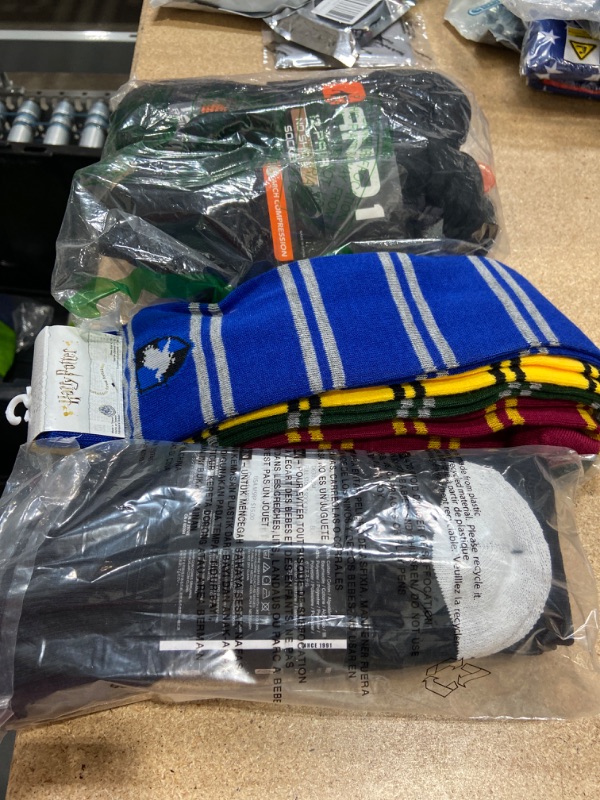 Photo 1 of **NO REFUNDS/RETURNS** -Bundle Of ASSORTED SOCKS different styles, sizes 