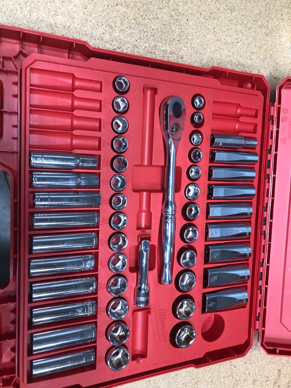 Photo 2 of *INCOMPLETE**
Milwaukee 3/8Inch-Drive Ratchet and Socket Set 56-Piece, SAE and Metric, Model 48-22-9008
