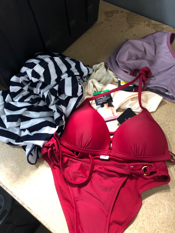 Photo 1 of BUNDLE OF ASSORTED WOMENS CLOTHING- BRAS, BIKINI, SHIRT. 