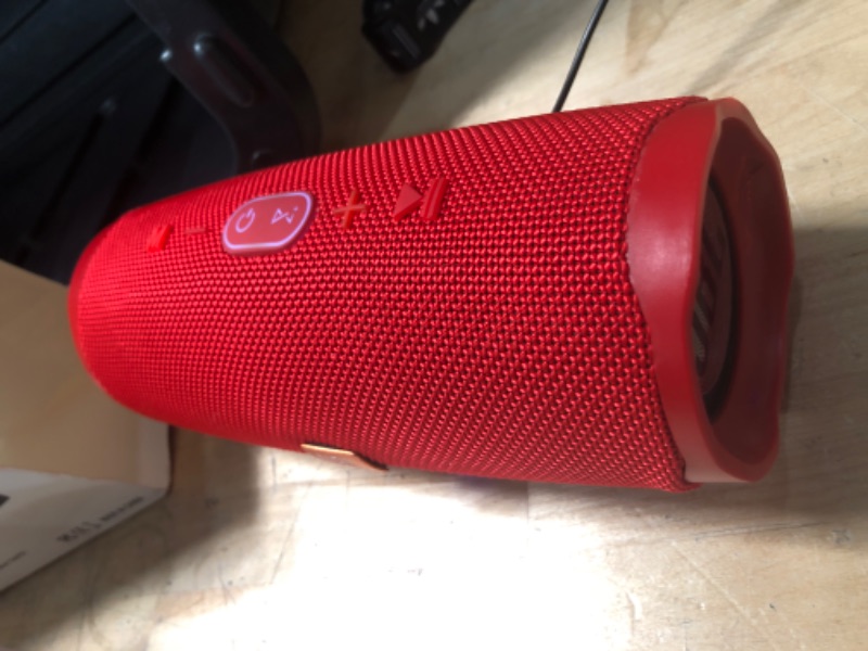 Photo 2 of *SEE NOTES* JBL CHARGE 4- Portable Bluetooth Speaker with IP67 Waterproof and USB Charge out - Red
**damaged, tested- working!**
