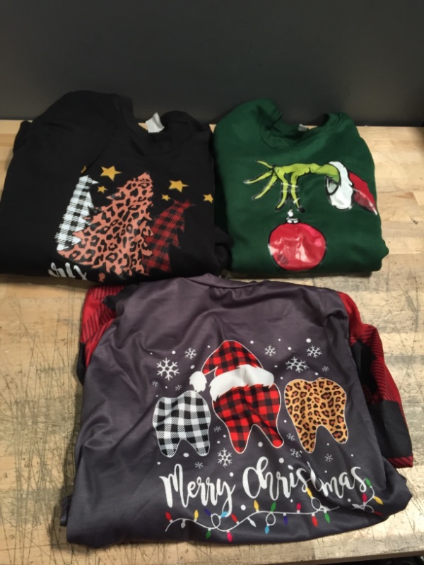 Photo 1 of CHRISTMAS CLOTHING BUNDLE NON REFUNDABLE 