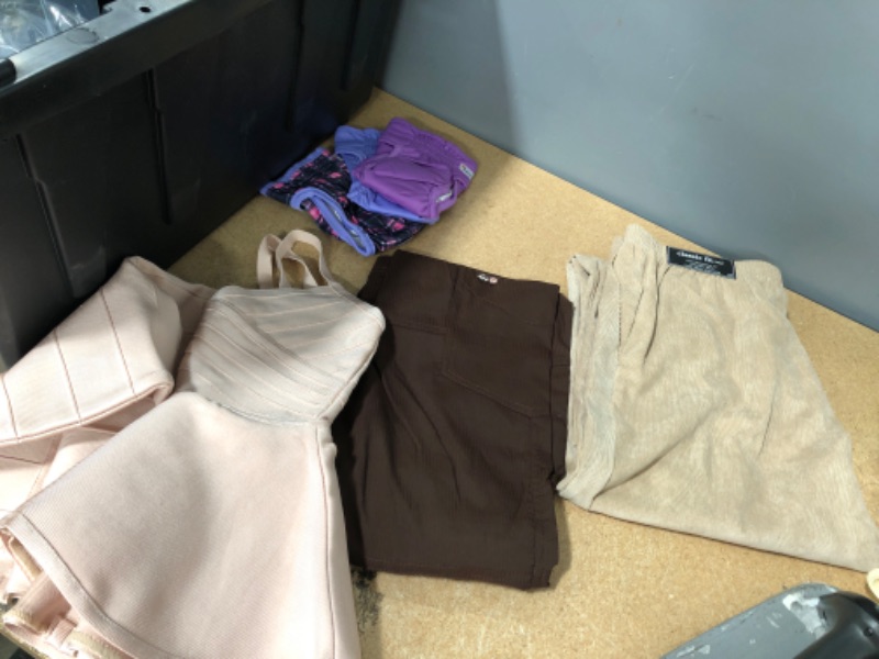 Photo 1 of Bundle of Assorted clothing items 
