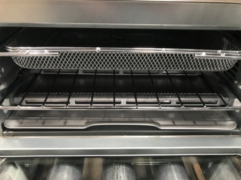 Photo 3 of Ninja SP301 Dual Heat Air Fry Countertop 13-in-1 Oven with Extended Height, XL Capacity, Flip Up & Away Capability for Storage Space, with Air Fry Basket, SearPlate, Wire Rack & Crumb Tray, Silver
