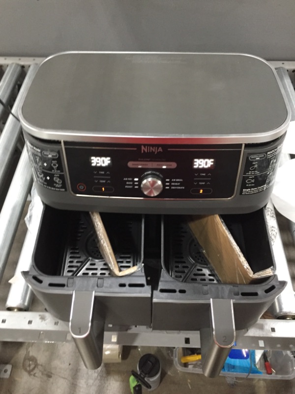Photo 1 of Ninja DZ401 Foodi 10 Quart 6-in-1 DualZone XL 2-Basket Air Fryer with 2 Independent Frying Baskets, Match Cook & Smart Finish to Roast, Broil, Dehydrate & More for Quick, Easy Family-Sized Meals, Grey