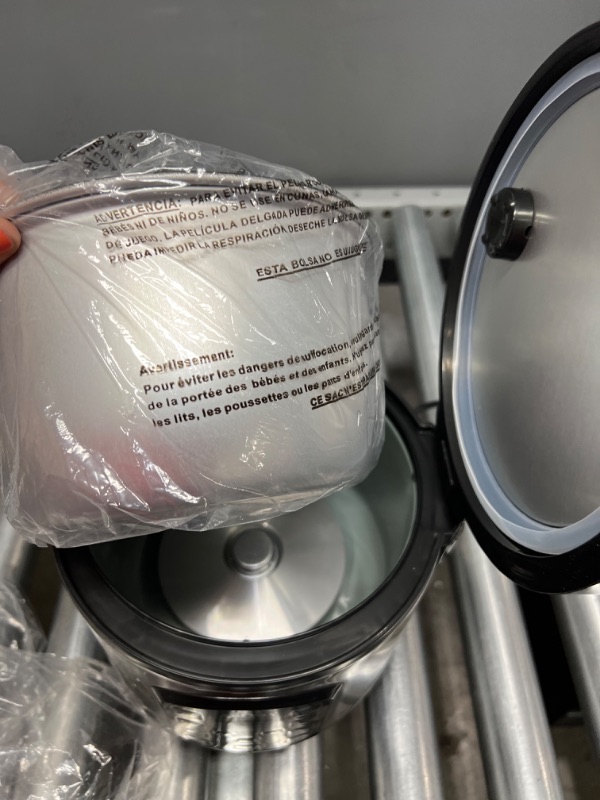 Photo 1 of Aroma Housewares ARC-954SBD Rice Cooker, 4-Cup Uncooked 2.5 Quart, Professional Version
MINOR DENT ON THE SIDE