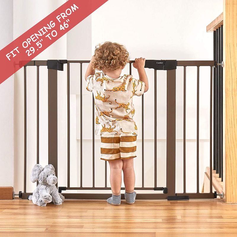 Photo 1 of Cumbor 29.5-46" Auto Close Safety Baby Gate, Extra Tall and Wide Child Gate, Easy Walk Thru Durability Dog Gate for House, Stairs, Doorways. Includes 4 Wall Cups and 2 Extension Pieces, Brown
