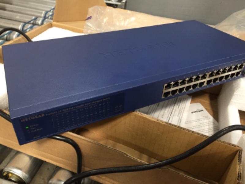 Photo 3 of NETGEAR 26-Port PoE Gigabit Ethernet Smart Switch (GS724TP) - Managed, 24 x 1G, 24 x PoE+ @ 190W, 2 x 1G SFP, Optional Insight Cloud Managemen