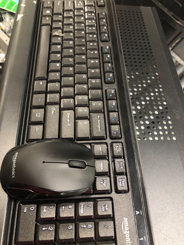 Photo 2 of Amazon Basics Wireless Computer Keyboard and Mouse Combo - Quiet and Compact - US Layout (QWERTY)
