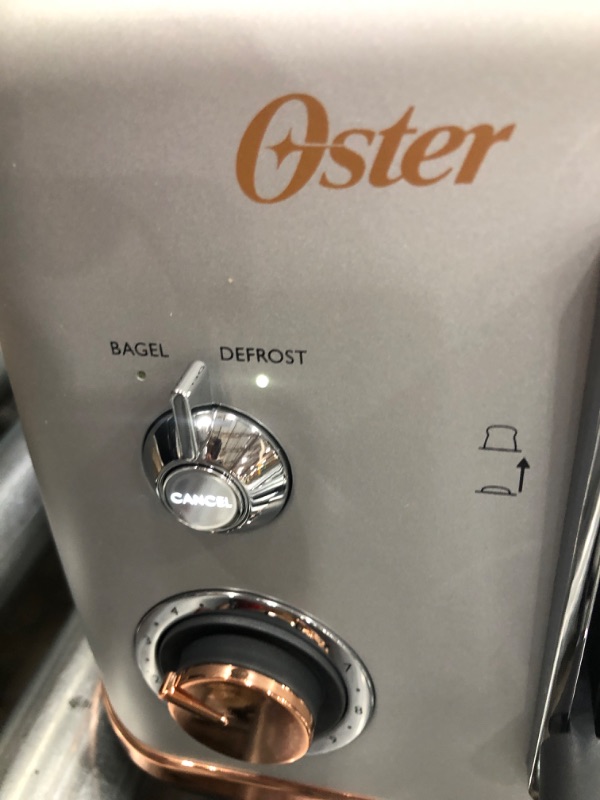 Photo 3 of Oster 2 Slice Toaster Silver-Rose Gold 1 Unit
