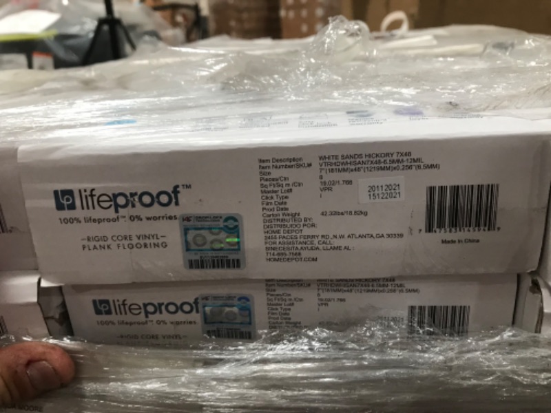 Photo 4 of (DAMAGED CORNERS) 
Lifeproof White Sands Hickory 7.13 in. W x 48.03 in. L Rigid Core Click Lock Luxury Vinyl Plank Flooring (19.01 Sq. ft./Case), 40 cases