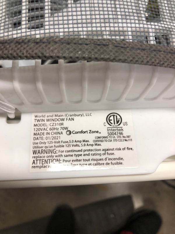 Photo 1 of Comfort Zone CZ310R 3-Speed 3-Function Expandable Reversible Twin Window Fan with Remote Control, Removable Cover