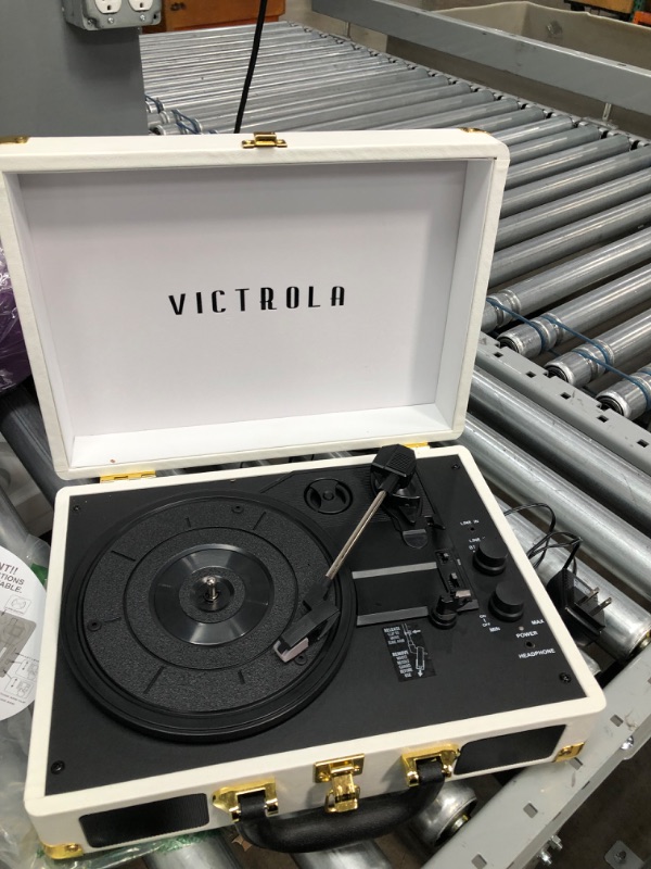 Photo 2 of *NOT FUNCTIONAL*
Victrola Vintage 3-Speed Bluetooth Portable Suitcase Record Player with Built-in Speakers | Upgraded Turntable Audio Sound| Includes Extra Stylus | White (VSC-550BT-WH)
