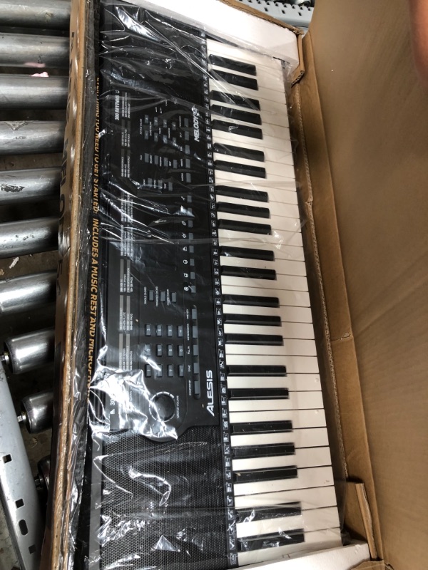 Photo 2 of ***PARTS ONLY*** Alesis Melody 54 - Electric Keyboard Digital Piano with 54 Keys, Speakers, 300 Sounds, 300 Rhythms, 40 Songs, Microphone and Piano Lessons
