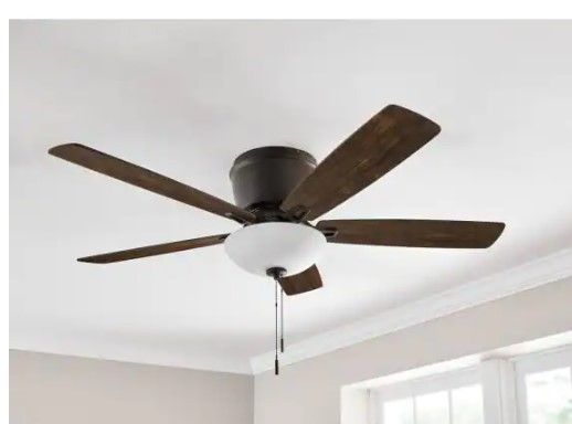 Photo 1 of 
Hampton Bay
Melrose 52 in. Indoor LED Hugger Bronze Dry Rated Ceiling Fan with Light Kit and 5 Reversible Blades