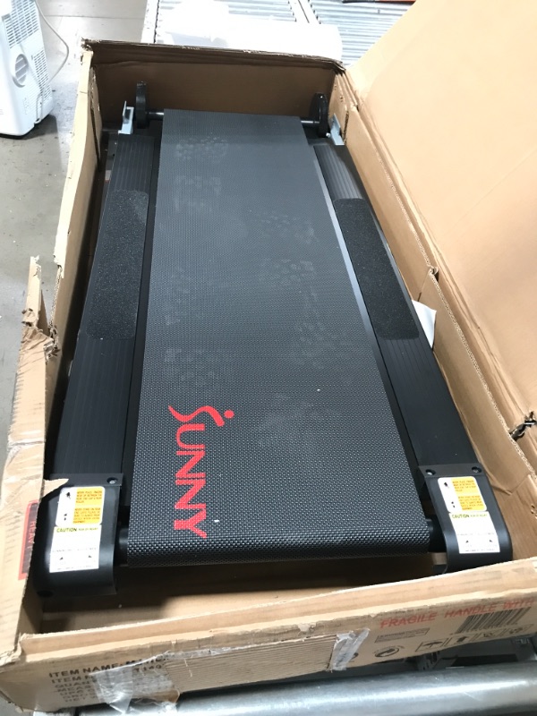 Photo 1 of (INCOMPLETE HARDWARE; DAMAGED PLASTIC COVERING)
Sunny Health & Fitness SF-T1407M Foldable Manual Walking Treadmill, Gray