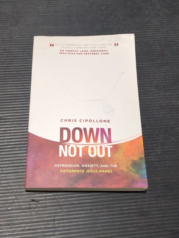 Photo 1 of Down, Not Out Paperback – May 1, 2018
