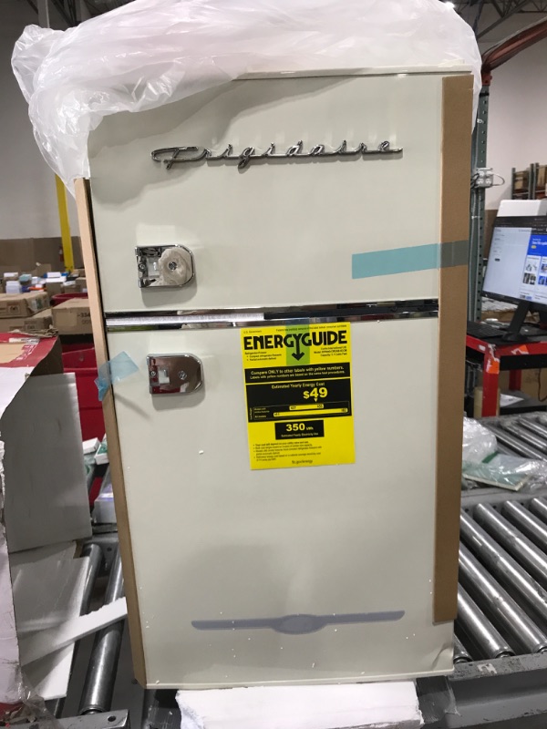 Photo 1 of FRIGIDAIRE EFR840-Cream EFR840 Retro Mini Fridge with Freezer & Side Bottle Opener-Small 2 Door Refrigerator for Office Bar or College Dorm Room-3.1 Cu Ft – 19”"D x 20.5" W x 33.5" H (Cream) Cream Double Door Refrigerator