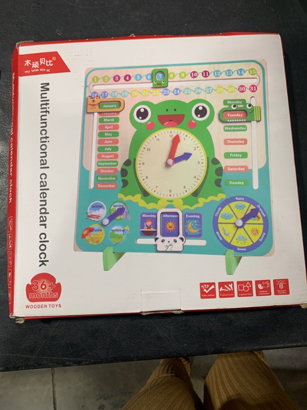 Photo 1 of LIANGLIDE Frog Calendar Clock Board Kids Wooden Calendar Clock Toy Children Preschool Educational Calendar Teaching Toys Days Dates Months Weather Season Time Toys Gifts Aged 3 Years