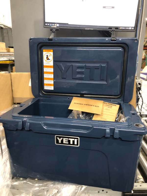 Photo 3 of **MINOR SCRATCH ON LID**
YETI Tundra 45 Quart Cooler - Navy