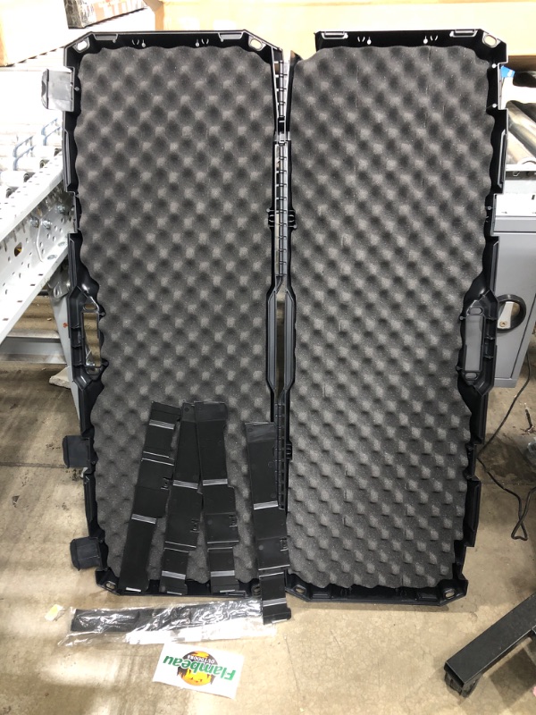 Photo 3 of **one back corner is broken see photo**
Flambeau Outdoors 6500AR AR Tactical Gun Case with ZERUST - 40 x 12 x 4 in. Hard Gun Case with Zerust Magazine Pockets and Straps for Ammunition, Firearm Storage Accessory