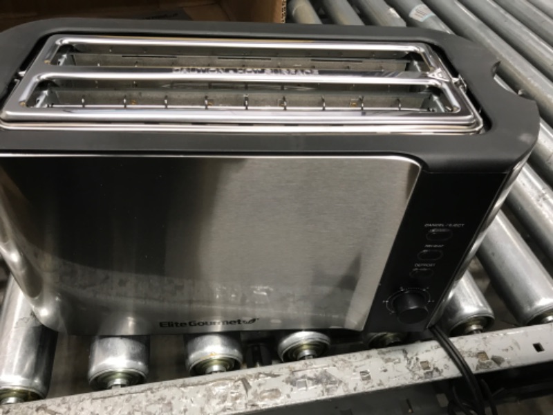 Photo 2 of *** POWERS ON ** Elite Gourmet ECT-3100# Long Slot 4 Slice Toaster, Reheat, 6 Toast Settings, Defrost, Cancel Functions, Built-in Warming Rack, Extra Wide Slots for Bagels Waffles, Stainless Steel & Black

