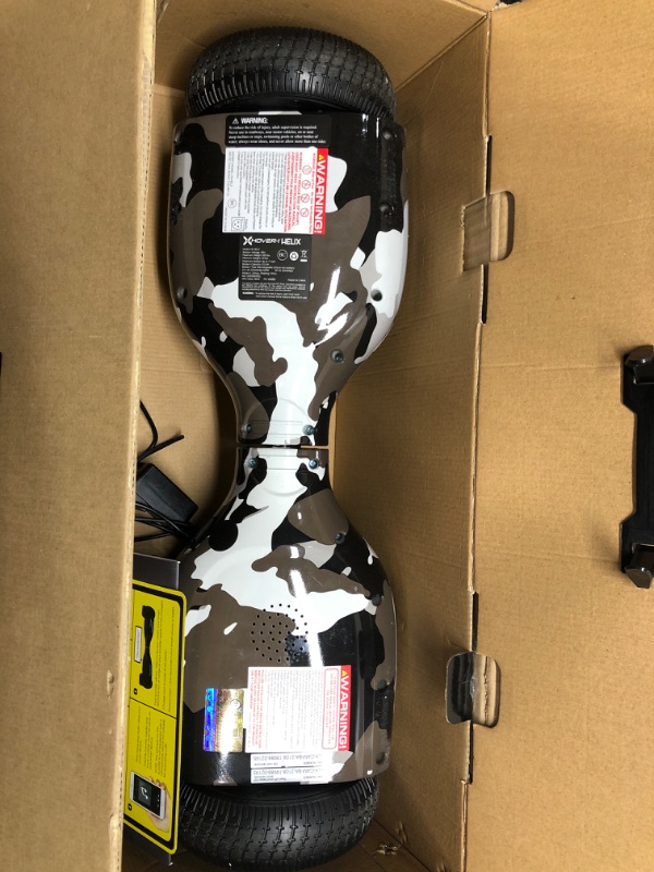 Photo 2 of **SEE NOTES**
Hover-1 Helix Electric Hoverboard | 7MPH Top Speed, 4 Mile Range, 6HR Full-Charge, Built-in Bluetooth Speaker, Rider Modes: Beginner to Expert Hoverboard Camo