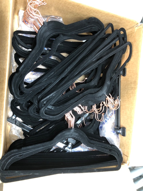 Photo 2 of Amazon Basics Slim, Velvet, Non-Slip Suit Clothes Hangers, Black/Rose Gold - Pack of 100 Black/Rose Gold 100-Pack Suit Hangers