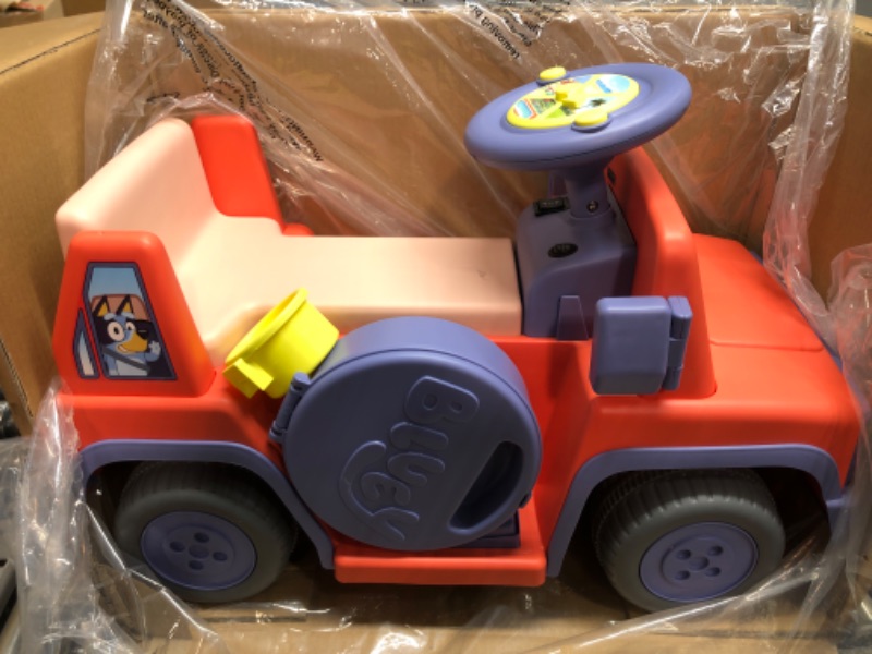 Photo 1 of Bluey 6V Ride On Car for Toddlers - Interactive Electric Car for Kids with Sound Effects & Music, Riding Toy for Boys & Girls, Includes 6V Rechargeable Battery & Charger
