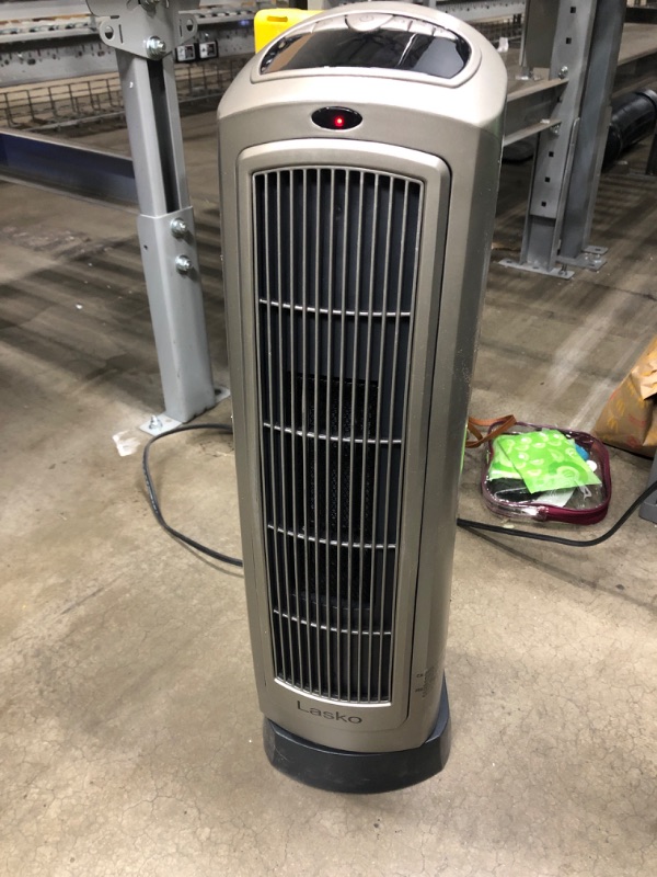 Photo 1 of Lasko 1500W Portable Oscillating Ceramic Heater Tower w/ Digital Display**used**