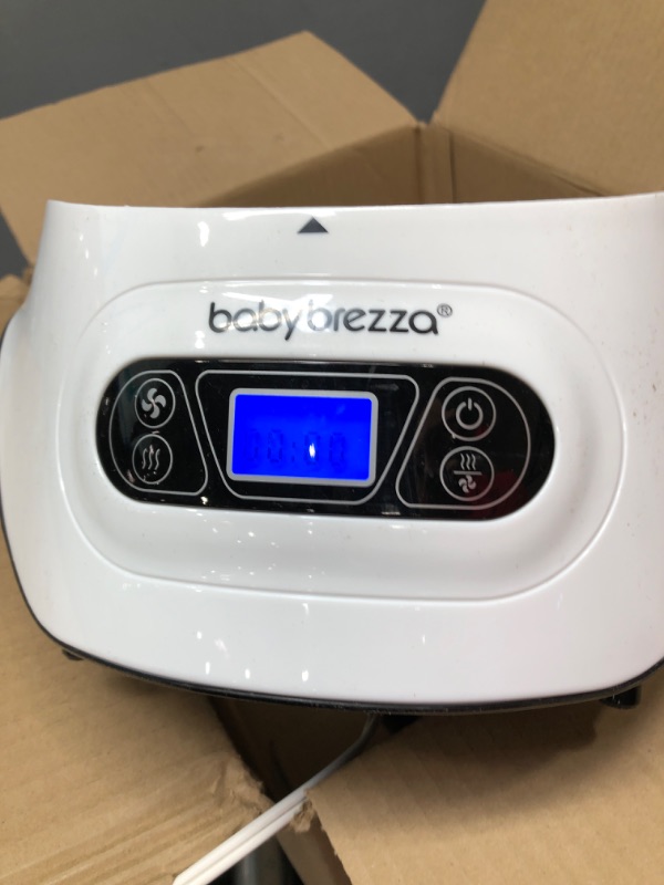 Photo 2 of Baby Brezza Baby Bottle Sterilizer and Dryer Machine – Electric Steam Sterilization - Universal Fit - Pacifiers, Glass, Plastic, and Newborn Feeding Bottles