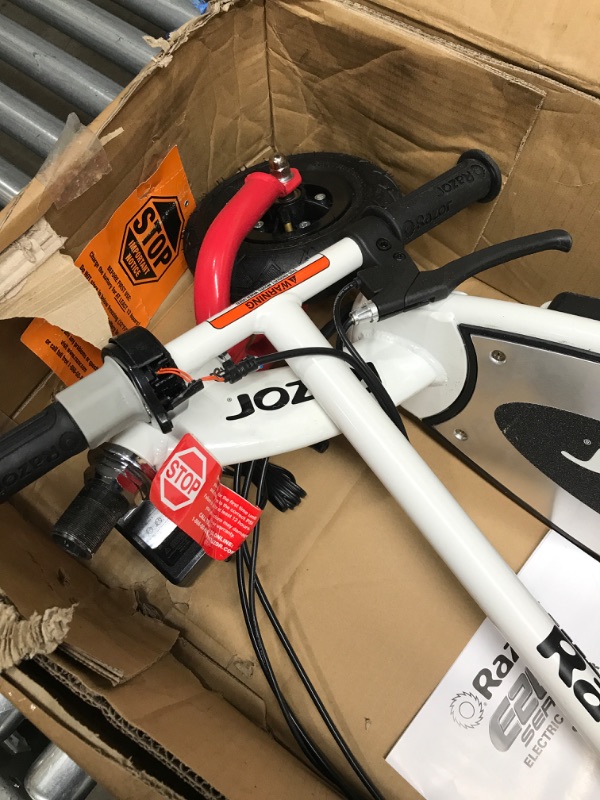 Photo 1 of Razor E200 Electric Scooter - 8" Air-Filled Tires, 200-Watt Motor, Up to 12 mph and 40 min of Ride Time
