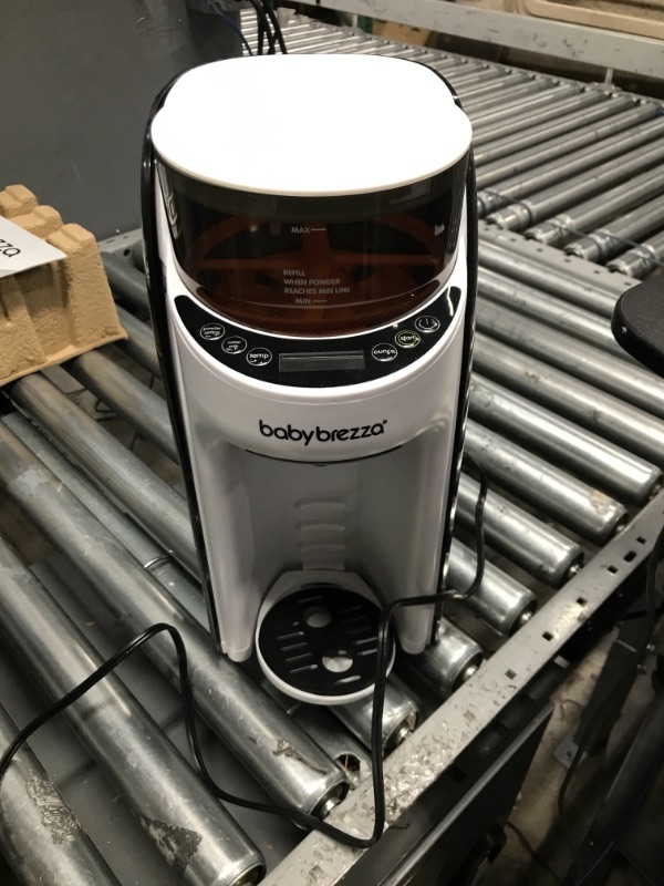 Photo 1 of New and Improved Baby Brezza Formula Pro Advanced Formula Dispenser Machine - Automatically Mix a Warm Formula Bottle Instantly - Easily Make Bottle with Automatic Powder Blending