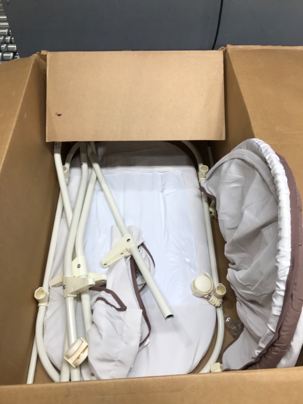 Photo 1 of Delta Children Deluxe Sweet Beginnings Bedside Bassinet - Portable Crib with Lights and Sounds, Falling Leaves Falling Leaves Bassinet