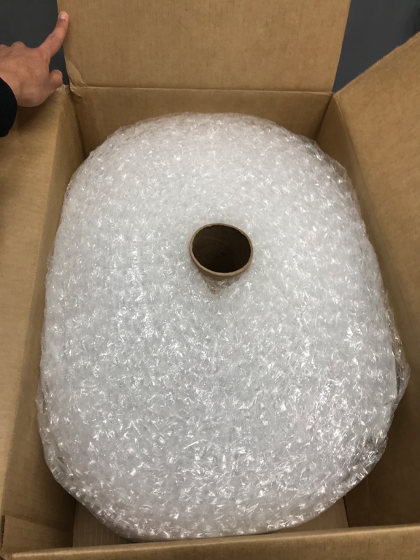Photo 1 of Amazon Basics Perforated Bubble Cushioning Wrap - Medium 5/16", 12-Inch x 100-Foot Long Roll
